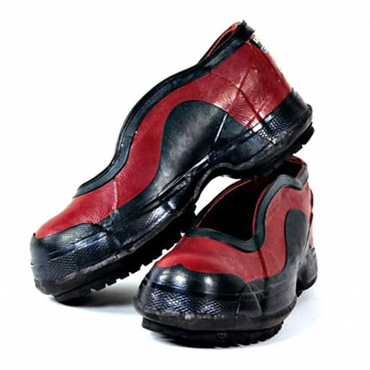 Pair of red and black slip-on athletic shoes with thick black soles on a white background.